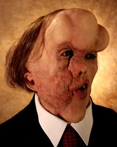 They never get the damned lighting right in passport photos