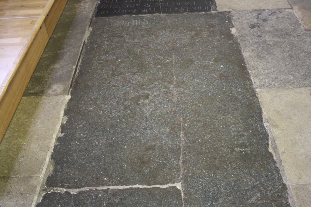 A tomb in the floor of the cathedral