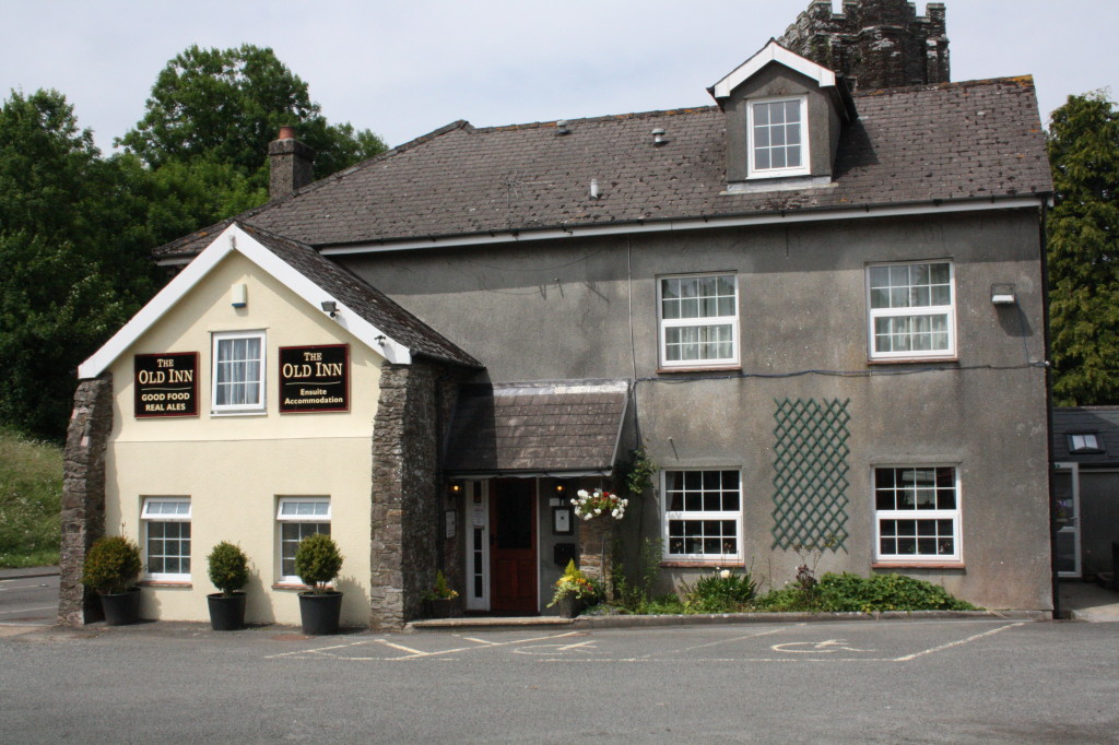 Inside, it looks exactly like an English pub should, right down to the dart board and friendly dog.